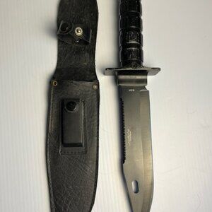 The BUDK Jungle survivor knife features a durable 8" stainless steel blade with